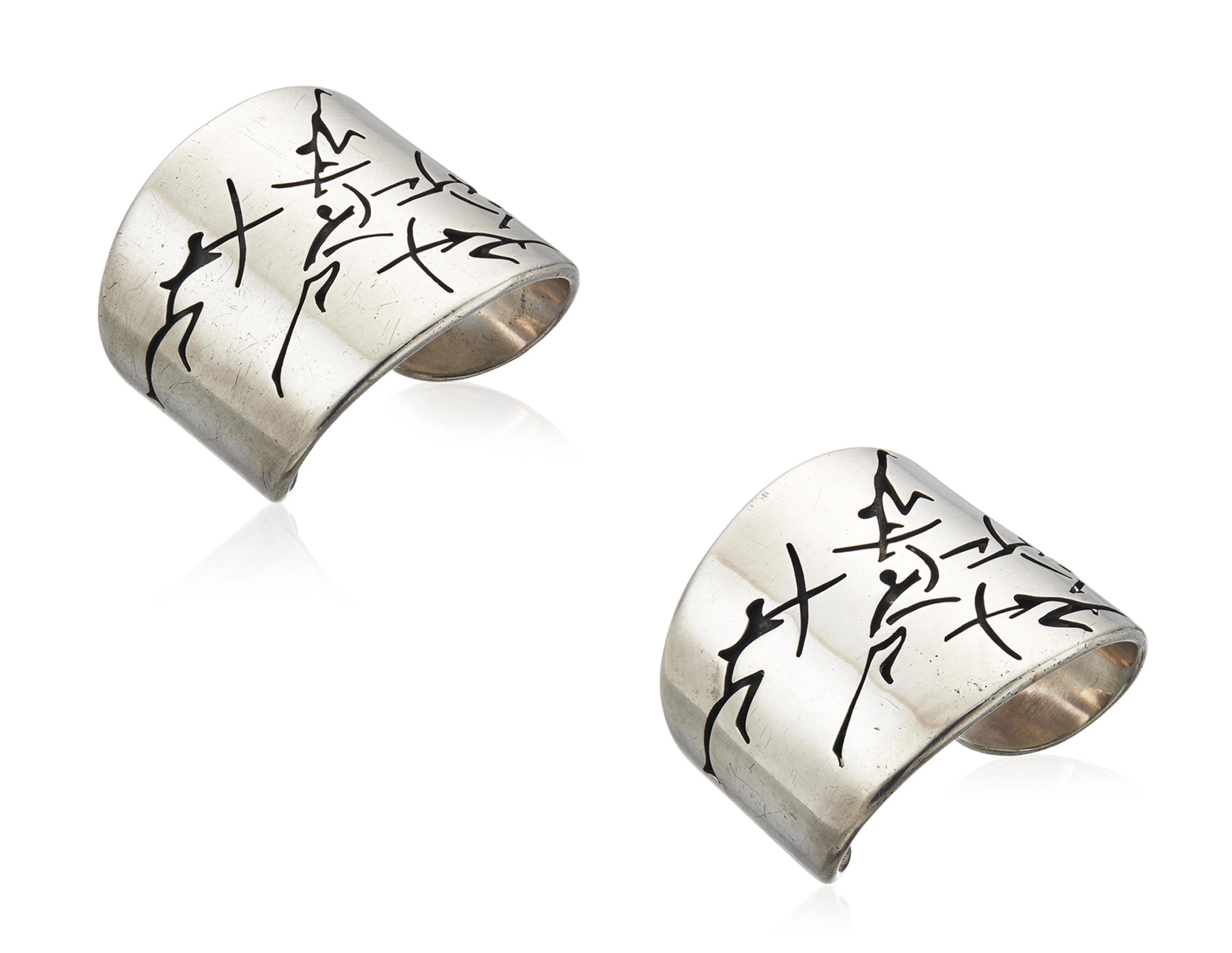Pair Of 'Native Warrior' Cuff Bracelets - Photo 1