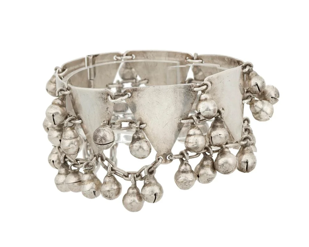A Hector Aguilar sterling silver bell bracelet, c.1940-1945. Hand-fabricated 940 silver with rounded bell drops, sold at John Moran Auctioneers in April 2023 for $2,080 against $31 of metal at the day's silver spot.