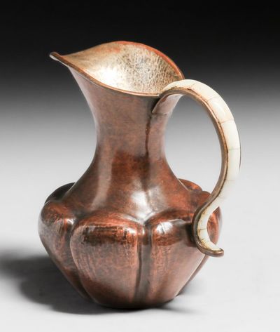 mixed metal service pitcher - Photo 1
