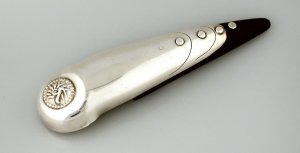 Ebony Bottle Opener with a Feathered Serpent Seal on One - Photo 1