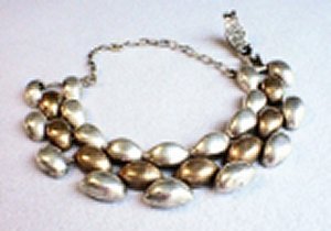 Bracelet of Silver and Bronze Elongated "beads" That Seem - Photo 1