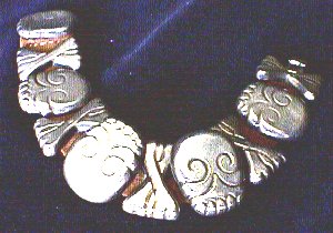 Ten Stylized "Day of the Dead" Links Are Threaded - Photo 1