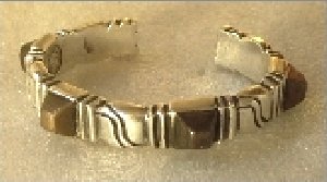 Silver and Bronze Bracelet - Photo 1