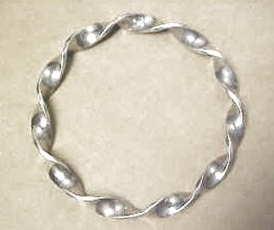 Twisted Silver Band Bangle Bracelet - Photo 1