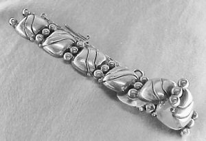 "pillow" Bracelet with Silver Diagonal Band on Each Link - Photo 1