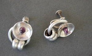 Earrings Have an Amethyst Set on a Silver Disc - Photo 1