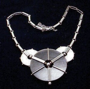 Obsidian Disc with Flanking Smaller Silver Discs - Photo 1