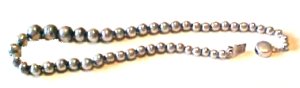 Simple Single Strand of Graduated Silver Beads - Photo 1
