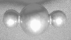 Pin of a Silver Ball Flanked on Two Sides by a Smaller - Photo 1