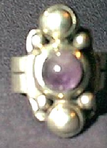 Wide Banded Ring Set with One Cabochon Amethyst - Photo 1