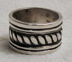 Ring with Wide Silver Band Incorporating a Rope Design - Photo 1