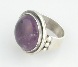 Ring with Large Cabochon Amethyst Flanked by 3 Small Beads - Photo 1